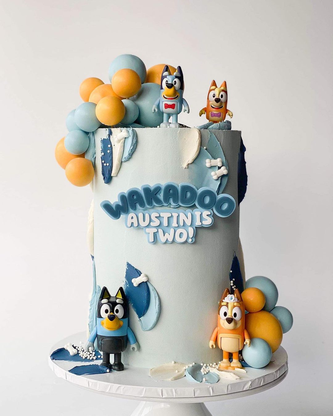 a Bluey second birthday cake