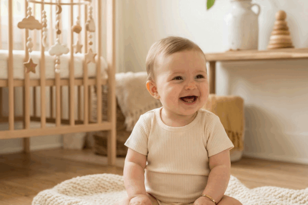 Happy smiling baby for baby names meaning joy peace and hope article