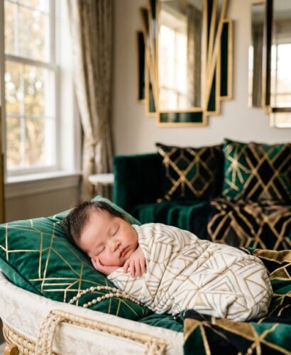 Baby Girl in an elegant room with art deco mirrors and geometric patterned fabrics — 200+ Art Deco Baby Names From the Glamorous 1920s and 1930s