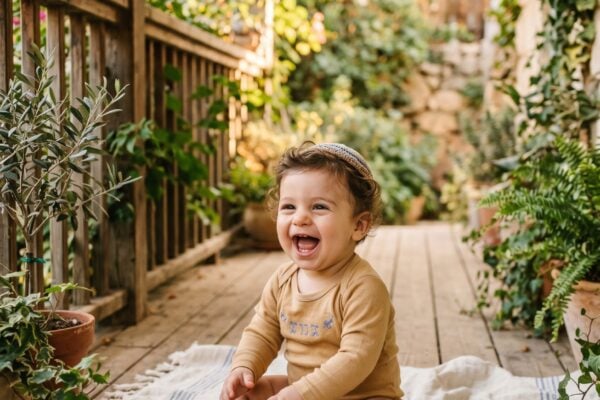Baby Boy in a light-filled garden porch with weathered timber and soft greenery — Jewish Baby Boy Names With Hebrew Strength