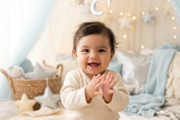 Baby in a dreamy studio with ethereal pale blue and moon elements — Moon Baby Names That Are Quietly Stunning