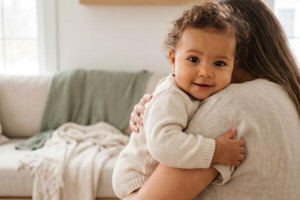 Baby in a light-filled Scandinavian room with modern lines and natural wood — Trending Baby Names of 2026 So Far