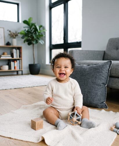 Baby Girl in a bright modern living room with clean lines and light — 200+ Cool Girl Names That Are Effortlessly Confident