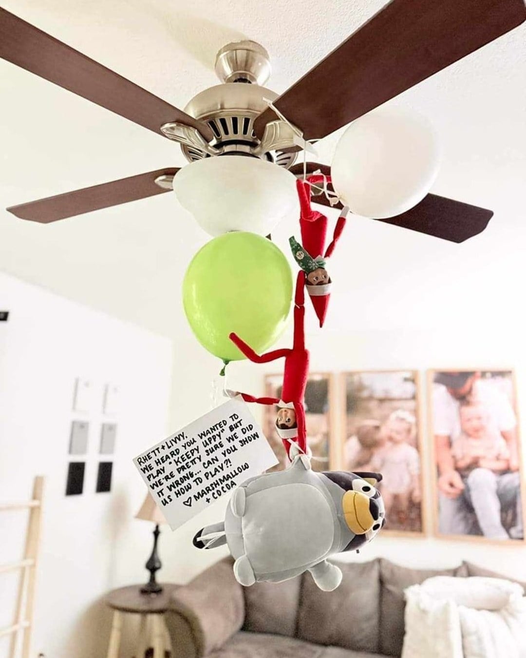 Elf on the Shelf posed mid-air batting a balloon like Bluey's Keepy Uppy game