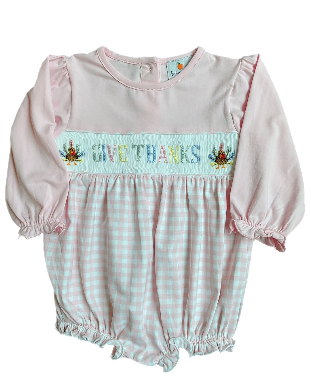 Pink long-sleeve baby bubble romper with a gingham skirt and a smocked Give Thanks panel between two turkeys