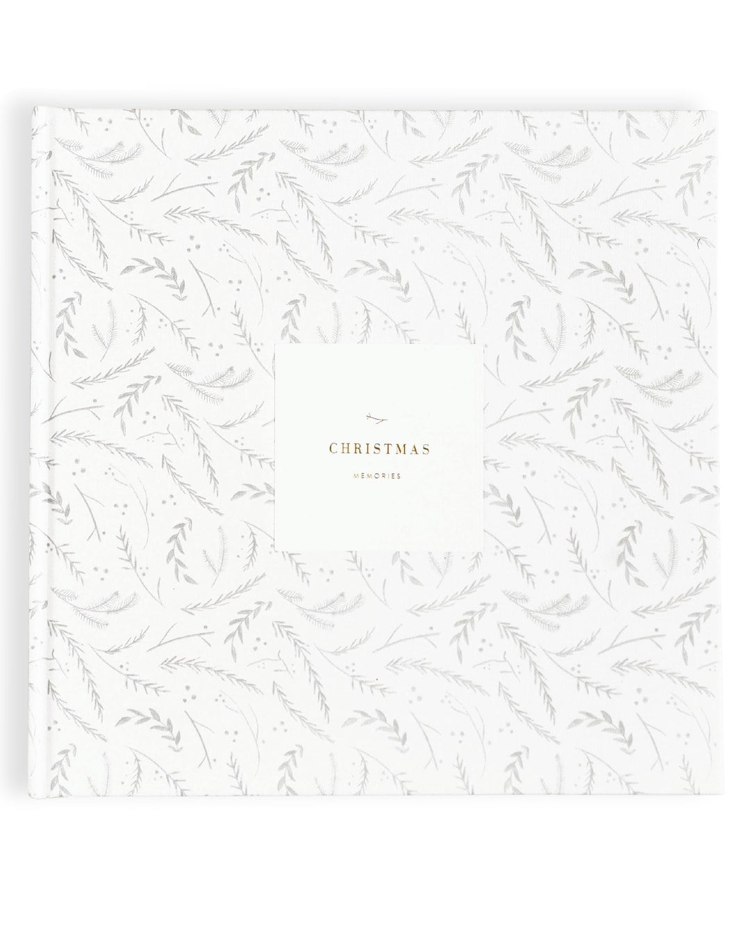 A white hardcover Christmas Memories journal with a grey sprig pattern, laid flat